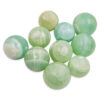 Green Pistachio Calcite Sphere - Crystal Dreams