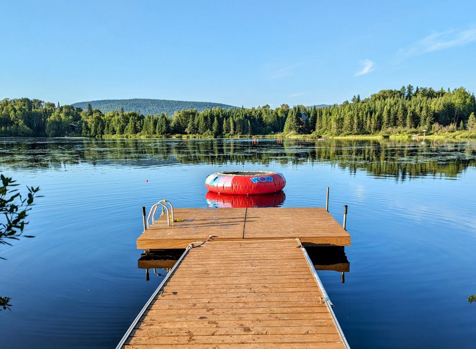 Private dock with lake access at a St-Donat vacation rental.