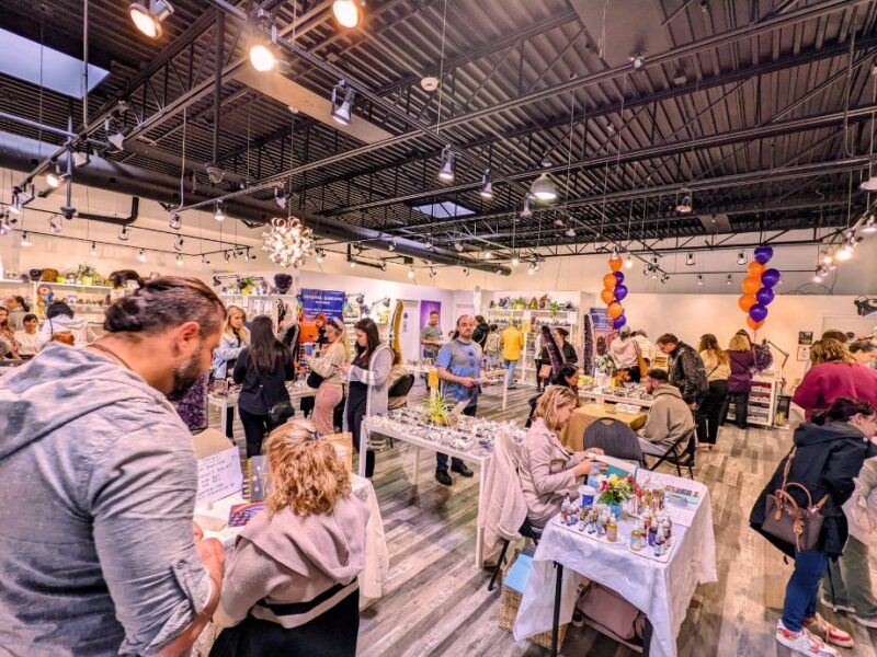 Visitors exploring vendors and crystals at the Crystal Dreams Wellness and Spirituality Event