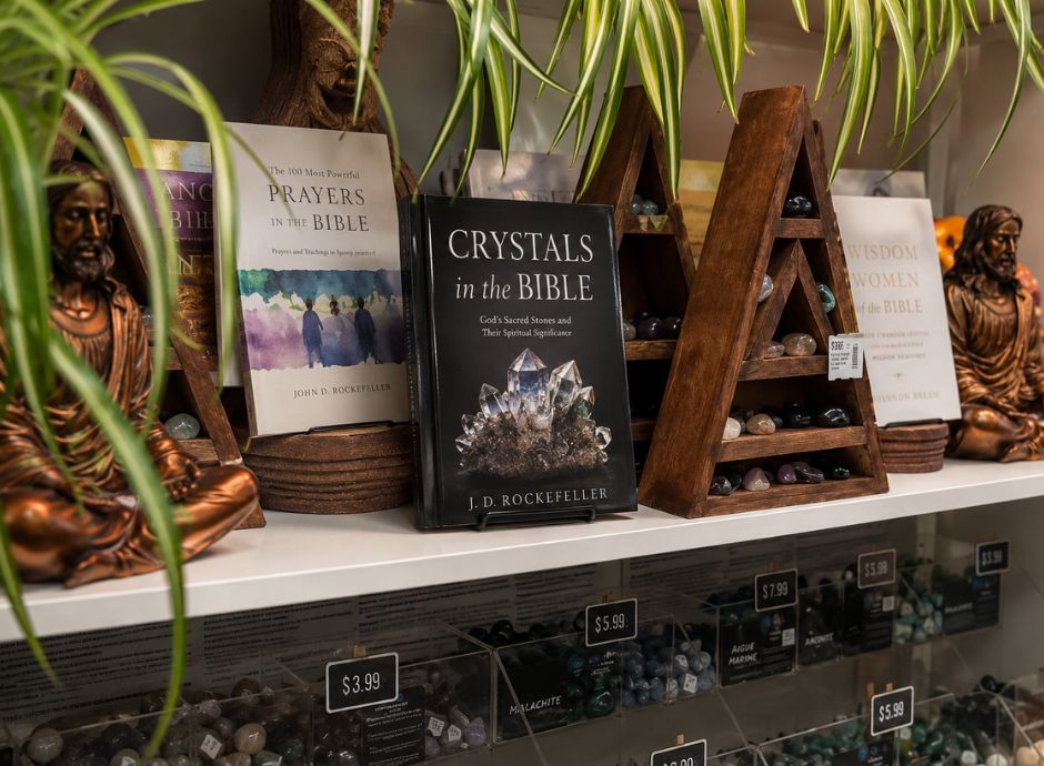 Crystals and spiritual books displayed in a crystal shop inspired by biblical symbolism